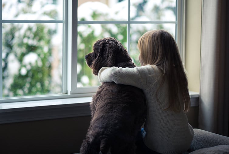 bigstock-Little-girl-and-her-dog-lookin-56510144